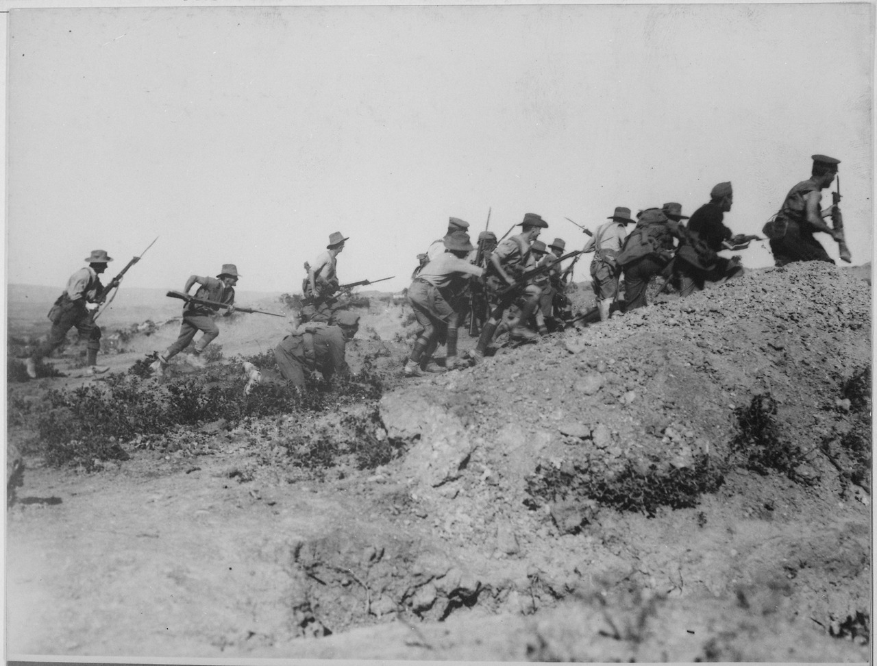 Australian troops charge a Turkish trench. Wikimedia Commons